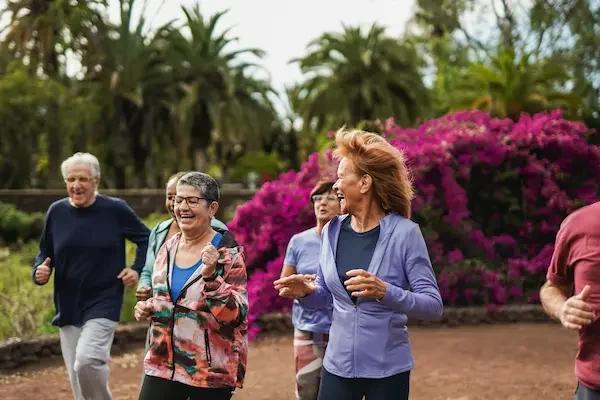 multiracial-senior-people-running-together-at-city-2026-01-08-22-00-33-utc