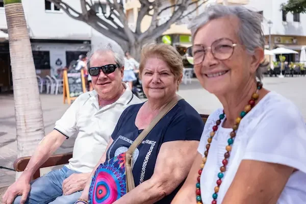 three-caucasian-senior-retired-people-sitting-outd-2026-01-09-11-02-29-utc