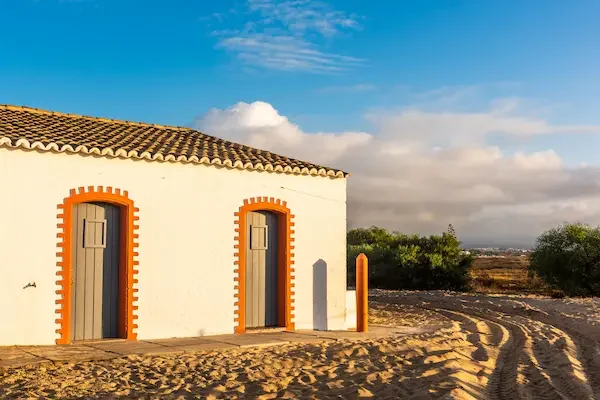 traditional-fisherman-house-on-beach-in-portugal-2025-03-26-08-03-03-utc